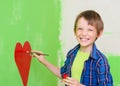 Boy painting on the wall Royalty Free Stock Photo