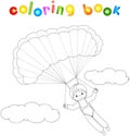 Boy parachutist descends from the sky on a parachute through the