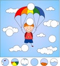 Boy parachutist descends from the sky on a parachute through the