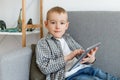 Boy without parental control wasting time playing games