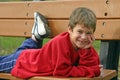 Boy on Park Bench Royalty Free Stock Photo