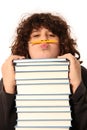 Boy with pencil and books