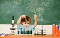 Boy performing chemistry test. Wunderkind and early development. Small pupil learn chemistry school. Chemistry