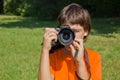 Boy with photocamera Royalty Free Stock Photo