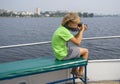 Boy photographing on the ship Royalty Free Stock Photo