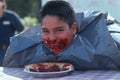 Boy at pie eating contest Royalty Free Stock Photo