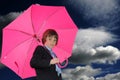 Boy with pink umbrella Royalty Free Stock Photo