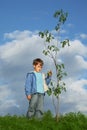 Boy plants the tree Royalty Free Stock Photo