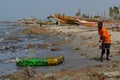A beach covered by plastic litter in the Petite CÃÂ´te of Senegal, Western Africa Royalty Free Stock Photo