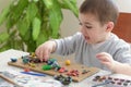 Boy with plasticine