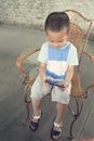 Boy play smartphone Royalty Free Stock Photo