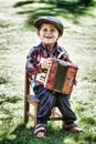 Boy playing accordion