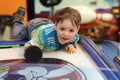 Boy playing air hockey Royalty Free Stock Photo