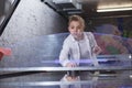 Boy playing on air hockey table Royalty Free Stock Photo