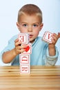 Boy playing with alphabet blocks Royalty Free Stock Photo