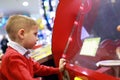 Boy playing in amusement park Royalty Free Stock Photo