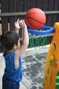 Boy playing basket ball