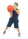 Boy playing basketball isolated Royalty Free Stock Photo