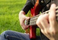 Boy playing the bass guitar Royalty Free Stock Photo