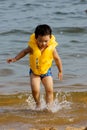 Boy playing on beach Royalty Free Stock Photo