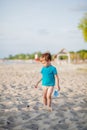 Boy playing on beach. Child play at sea on summer family vacation. Sand and water toys, sun protection for young child. Little boy Royalty Free Stock Photo