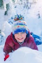 Boy playing in big snow in winter. Royalty Free Stock Photo