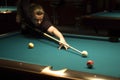 Boy playing billiard Royalty Free Stock Photo