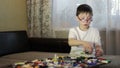 Boy playing with blocks.