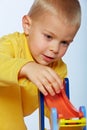 Boy playing with cars Royalty Free Stock Photo