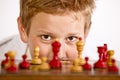 Boy playing chess Royalty Free Stock Photo