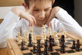 Boy playing chess