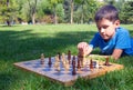 Boy playing chess Royalty Free Stock Photo