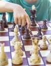 Boy playing chess