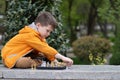 Boy playing chess outdoor. Learning strategic game. Education Royalty Free Stock Photo