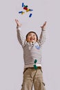 Boy playing with colorful wood blocks