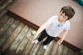 Boy playing cup and ball Royalty Free Stock Photo