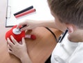 Boy playing doctor with stethoscope