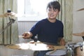 Boy Playing Drum Kit At Home Royalty Free Stock Photo