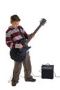 Boy playing an electric guitar isolated Royalty Free Stock Photo