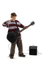 Boy playing an electric guitar isolated Royalty Free Stock Photo