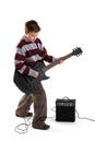 Boy playing an electric guitar isolated Royalty Free Stock Photo