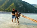 Boy playing in Fella river, Northeast Italy