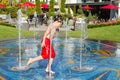 Boy playing in the fountain Royalty Free Stock Photo