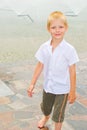 Boy playing in the fountain Royalty Free Stock Photo