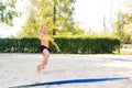 Boy playing with frisbee on the beach. Child spending carefree time. Summer vacations with kids Royalty Free Stock Photo