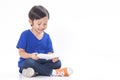 Boy playing a game on computer tablet Royalty Free Stock Photo
