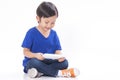 Boy playing a game on computer tablet Royalty Free Stock Photo