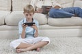 Boy Playing Games On PSP