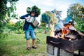 Boy playing garmony near the fireplace Royalty Free Stock Photo