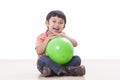 Boy playing green ball Royalty Free Stock Photo